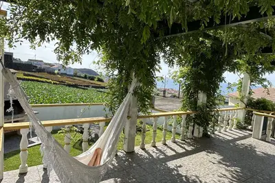 Image de Casa do Alemão - maison de vacances parfaite avec vue sur la mer