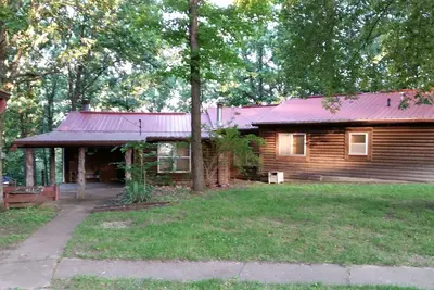 Image de Belle, élégante mais rustique cabine sur une crique tranquille de la célèbre Pomme De Terre