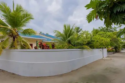 Image de Maison d'hĂ´tes Maclura Residence Ă Baa Maalhos, avec quatre chambres