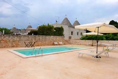 Image de Trulli \"Sole\" Immerge Au Coeur De La Valle D'Itria