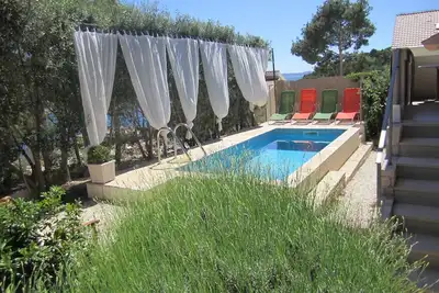 Image de Villa avec piscine privée et vue sur la mer à 40 mètres de la mer