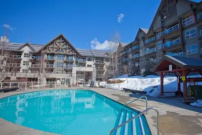 Image de Pente Deluxe Side Condo À trembles, vrai ski in / ski out