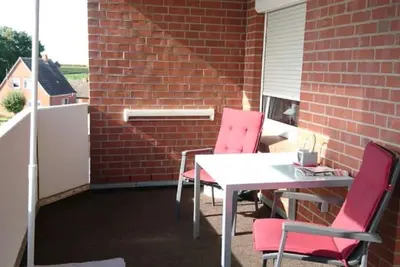 Image de Petit appartement de vacances à Dornumersiel heureux avec chien