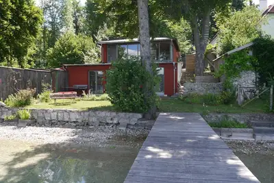 Image de Cottage sur Pilsensee avec accès direct au lac et à quai