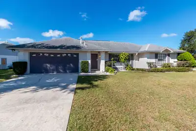 Image de Excellente maison de vacances près de Disney, avec piscine privée, 3 téléviseurs, Wi-Fi gratuit