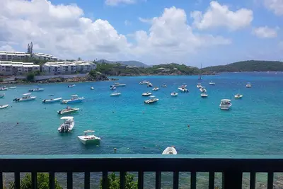 Image de Sunkissed Serenity - une maison luxueuse et à couper le souffle en bord de mer à Cowpet Bay
