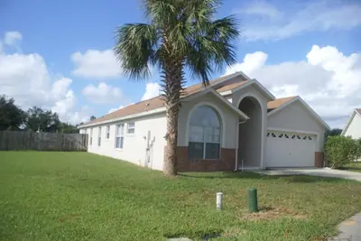 Image de Belle villa de 5 chambres / 4 salles de bain complètes - piscine privée et spa près de Disney!