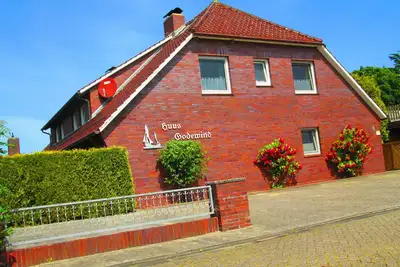 Image de Top maison de vacances, 7 p. , Sauna, 2 salles de bain, Wlan, Tel. , Cheminée, Strandk. , Patio, chien joueur