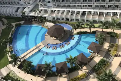 Image de Meilleure valeur 5 étoiles QCondo à travers Mall of Asia, près de l'aéroport, des casinos et de la baie de Manille