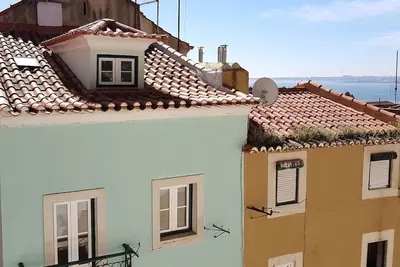 Image de Estevao C – Duplex 2 chambres • 2 sdb • Vue Tage • Coeur Alfama