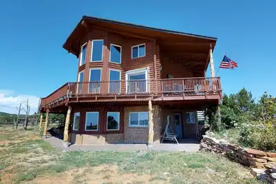 Image de Cabine familiale majestueuse avec vue imprenable!