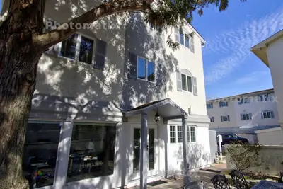Image de Ocean Block Town Home avec deux piscines, tennis et activités gratuites Inc. Golf, parc aquatique et plus encore!
