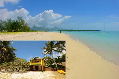 Image de Villa Eastern Wind pieds dans l'eau sur la magnifique plage de Pointe d'Esny