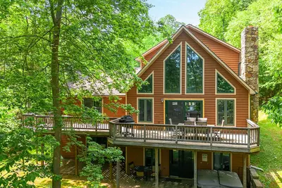 Image de Accueil au bord du chien avec bain à remous!