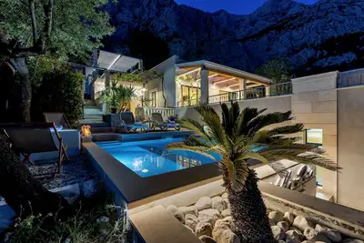 Image de Piscine, jacuzzi, sauna, gymnase, mini golf, vélos, barbecue, wifi gratuit