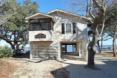 Image de Soundfront- 3 BRs, Embarcadère, Moustiquaire, terrasse couverte, Com Piscine, Marina et tennis