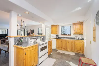 Image de Condo avec grand accès ski et garage chauffé.