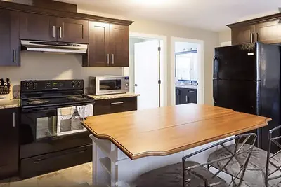 Image de Suite 2br spacieuse pour voyages d'affaires et en couple ou en famille