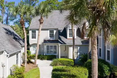 Image de Maison de ville avec 3 chambres et vue sur le lagon et le golf. Vélo à la plage et Animaux acceptés!