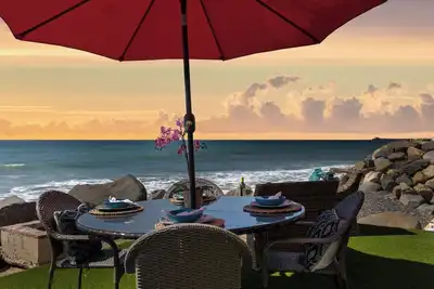 Image de Superbe maison unifamiliale en bord de mer sur le sable, équipée d'un système de climatisation central