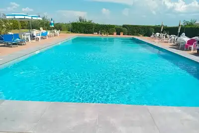 Image de Joli appartement pour 4 personnes avec Wifi, piscine, animaux admis et parking