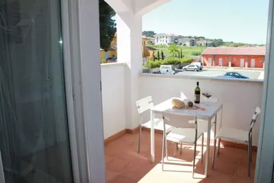 Image de Confortable appartement avec climatisation, piscine, Wifi, Tv, balcon, animaux admis et parking