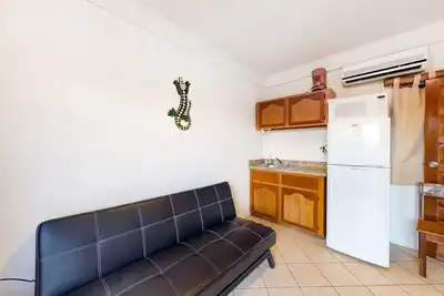 Image de Suite confortable avec vue sur la piscine partagée - excellent emplacement, promenade rapide vers la plage!