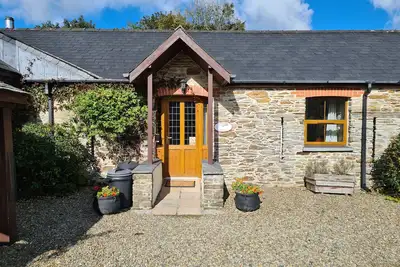 Image de Sandpiper Cottage, pet friendly, avec piscine en Llanboidy, Réf 924598