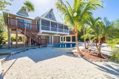 Image de P58 - Gulf Front Luxe 4 chambres 4 salles de bain avec piscine privée et dockage en eau profonde?