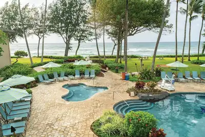 Image de Kauai, 2br: WiFi gratuit, complexe hôtelier en bord de mer, piscine, spa, près du marché aux noix de coco