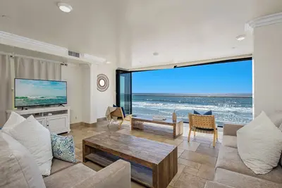 Image de Nouveau front de mer 11br / 11ba maison sur le sable w / terrasse sur le toit, un spa, A / C équipée