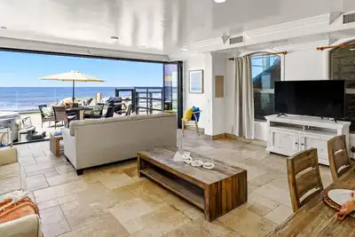 Image de Magnifique condo en bord de mer avec patio, spa et barbecue.