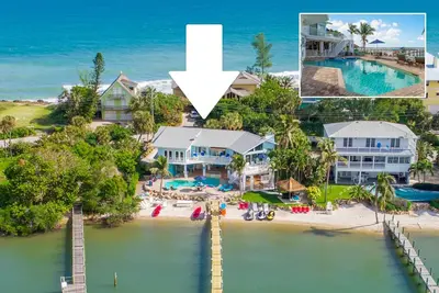 Image de Verseau: Maison privée 5br / 4ba en bord de mer, quai, piscine chauffée + spa, et plus encore!