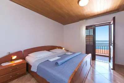 Appartement de deux chambres avec le balcon et la vue sur le mer Brela, Makarska (A-2752-b)