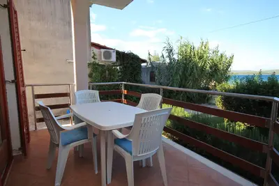 Image de Appartement d'une chambre avec la terrasse et la vue sur le mer Kraj, Pasman (A-8247-c)