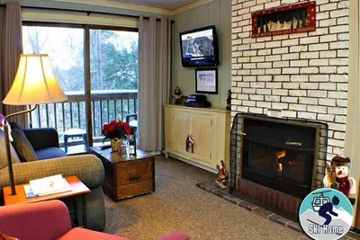 Image de Ski à la maison à ce magnifique condo avec navette pour les pentes