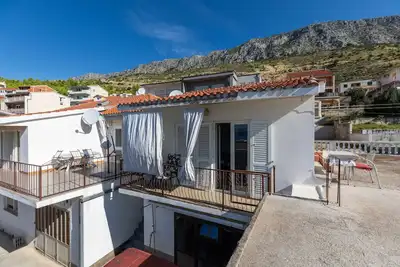 Image de Appartement d'une chambre avec le balcon et la vue sur le mer Dugi Rat, Omis (A-11483-a)