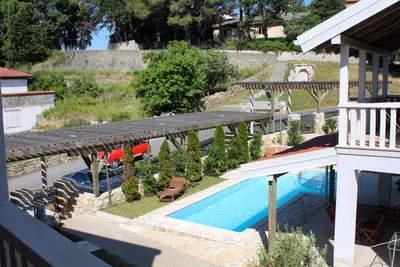 Image de Appartement d'une chambre avec la terrasse Palit, Rab (A-3210-f)