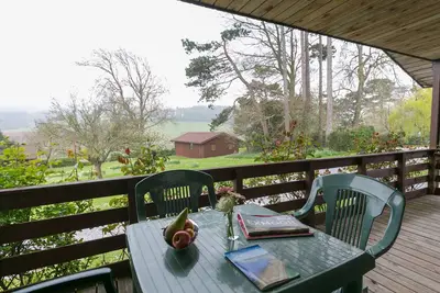 Image de Quatre étoiles Lodge avec deux chambres, une vue magnifique, mais à proximité des pubs et de la plage
