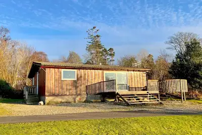 Image de Cockleshell Lodge situé au bord de l'eau près de Otter Ferry-Animaux acceptés
