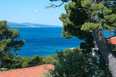 Appartement de trois chambres avec la terrasse et la vue sur le mer Brela, Makarska (A-2717-b)