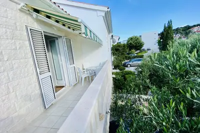 Image de Appartement de deux chambres prés de la plage Postira, Brac (A-2928-a)