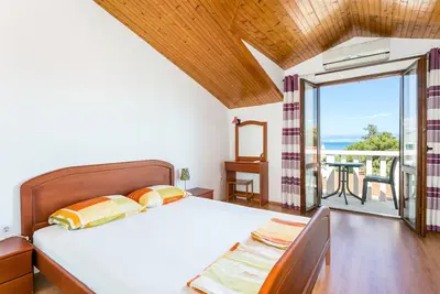 Image de Appartement de trois chambres avec le balcon et la vue sur le mer Supetar, Brac (A-5670-a)