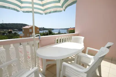 Appartement d'une chambre avec la terrasse et la vue sur le mer Baie Soline, Dugi otok (A-448-c)