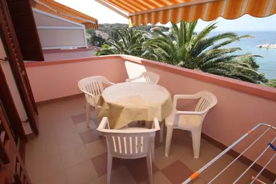 Image de Appartement de deux chambres prés de la plage Jakisnica (Pag) (A-6424-a)