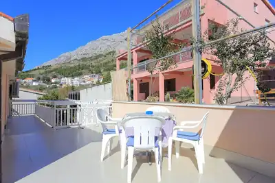 Image de Appartement d'une chambre avec la terrasse et la vue sur le mer Stanici, Omis (A-2818-d)