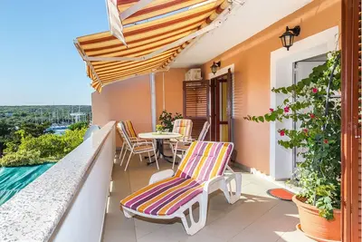 Image de Appartement de deux chambres avec la terrasse et la vue sur le mer Simuni, Pag (A-4083-a)