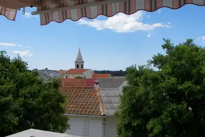 Image de Appartement d'une chambre avec la terrasse Novalja, Pag (A-212-d)