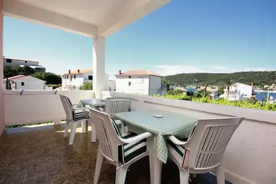 Image de Appartement de deux chambres avec la terrasse et la vue sur le mer Supetarska Draga - Donja, Rab (A-4981-a)