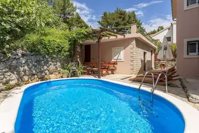 Image de Appartement de quatre chambres avec la terrasse et la vue sur le mer Medici, Omis (A-7461-a)